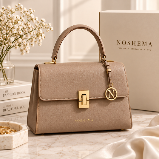 Celine Structured Bag by Noshema — taupe structured handbag with gold hardware and round N charm