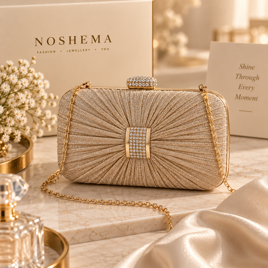 Lumière Evening Bag by Noshema — champagne-gold pleated evening clutch with jeweled clasp and chain